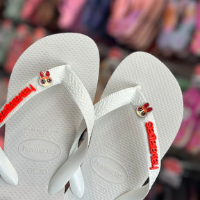Havaianas Top (Branco) + Pin meninas super poderosas e placa logo